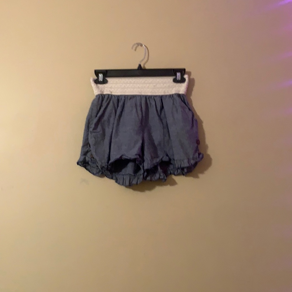 light denim ruffle shorts